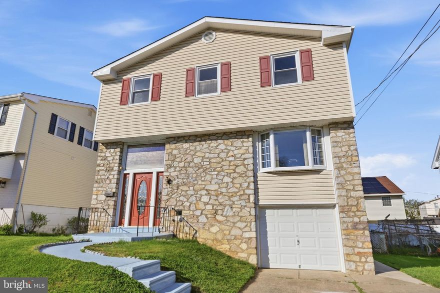Welcome to this beautifully updated single-family home in the desirable Somerton section of Northeast Philadelphia! This spacious 4-bedroom, 2.5-bath home has been freshly painted throughout and features modern upgrades that blend comfort, style, and functionality. Step inside to a bright and inviting layout featuring a large living room with a bay window, a welcoming foyer with marble flooring, chandelier, and coat closet, along with a formal dining room both offering easy-to-maintain tiled flooring, perfect for everyday living and entertaining. The brand-new eat-in kitchen is a true highlight, showcasing soft-close cabinetry, a built-in pantry, recessed lighting, and new stainless steel appliances including a dishwasher and exterior-vented hood. Upstairs, enjoy brand new vinyl flooring throughout, including all bedrooms, along with newly updated steps. The primary suite offers a private retreat with an en-suite bath featuring a beautifully tiled shower and ample closet space. Three additional generously sized bedrooms share a well-appointed full hallway bath. The lower level provides versatile additional living space, ideal for a family room, home office, or recreation area along with a convenient new half bath, laundry area, and direct access to the attached garage. Step outside to a covered patio and private backyard, perfect for entertaining or relaxing. Conveniently located just minutes from major highways and within walking distance to shopping, transportation, and schools, this home offers exceptional value in a prime location. Schedule your showing today! this is a must-see!