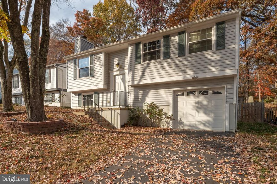 Beautiful Brazilian cherry hardwood floors on main level!  Recessed lighting throughout!  Split foyer with 3 bedrooms, 2 full baths, rec room with fireplace and new deck is ready for new tenants.  Main level features a large living/dining room combo, kitchen with granite counter tops, upgraded cabinets and stainless steel appliances.  Entertain and enjoy outdoor dining with family and friends on the large rear deck.  Down the hall from the living room is a full bath and 3 bedrooms.  A spacious rec room/multi purpose room, with wood burning brick fireplace, mantel and hearth, full bath and garage entrance are on the lower level.  Full size washer and dryer are located in the garage.  1 car over-sized garage offers storage space along with the lit attic storage space.  Fully fenced large backyard.  Great location for commuters with close access to I95, 495 and 395.  Springfield Metro/VRE are only a few miles away.  Plenty of dining, shopping and entertainment options at Springfield Town Centre.  Apply on the ROI Property Management website.
