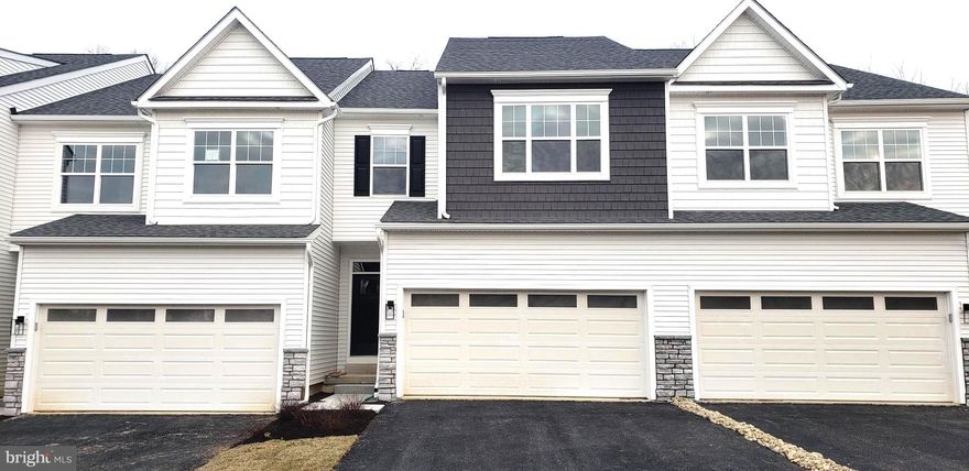 Move-In Ready Home with YEAR END SAVINGS! Special Incentives are ON NOW this December at Copperleaf Ridge! Call today for CASH INCENTIVE Details. This Quick Delivery Sutton home is waiting for your tour today! Perfectly nestled along a preserved wooded tree line in a thoughtfully designed community, just minutes from the charm and amenities of Kennett Square, this home has a generous extra special bonus toward closing costs - call for details!!  Enjoy luxury upgrades throughout, including exquisite granite countertops, soft-close Century cabinets, an oversized central island, stainless steel appliances, and 9-foot ceilings that enhance the open-concept design. A bank of windows creates an airy living space that opens to your low-maintenance rear deck, ideal for relaxing in nature or entertaining in style. Upstairs, retreat to an elegant primary suite with a spacious walk-in closet and ceramic tile bath, plus two additional bedrooms, convenient second-floor laundry, and a stylish shared bath. Built by Rouse Chamberlin Homes, a trusted local builder for over 45 years, this 3-bedroom, 2.5-bath, 2-car garage townhome also includes a full basement.  At Copperleaf Ridge, groundskeeping and snow removal are included, giving you more time to enjoy nearby Longwood Gardens, Historic Kennett Square, and everything this vibrant area has to offer. This home can be toured as the finishing touches are coming together beautifully for your opportunity to get settled this year!  The pictures are renderings of a similar home and of the model home for decorative example. See the specific home and Schedule your private tour today.