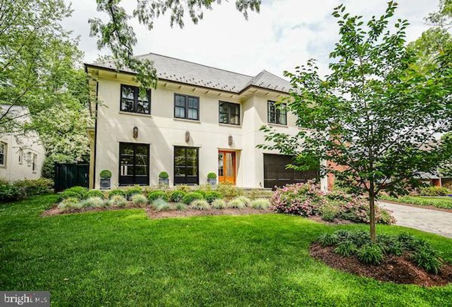 *ROSE TASTING - FRIDAY OPEN HOUSE 4-6PM...have a tour & drink to start off your weekend** WOW! Thomson & Cooke designed, custom built stucco home, lined by 8 continuously-burning gas lanterns by Bevolo (of New Orleans), is the initial curb appeal you'll encounter at this luxury home. Appointments abound at 5605 Durbin Road: hand-carved stair railing with a large skylight over 3 levels; 1st floor with 10ft+ ceilings & 9ft Lepage glass doors lining the back of the home; private back patio & terraced gardens that give off a California vibe (including outside stucco fireplace allows enjoyment most seasons to entertain or for private and peaceful enjoyment). Additional touches include two indoor gas fireplaces, two laundry rooms, a custom mudroom off customized 2-car garage that is photograph-ready.  The top floor with 5 bedrooms + 4 baths is perfect for anyone's needs including the Primary Suite w/ large private deck facing the garden & custom closets is a perfect retreat.  Full walk-out basement with 9ft ceilings throughout includes large family room with fireplace & wetbar, gym (or 7th BR), full bath, & a relaxing wine tasting room.

QUIET LOCATION only one mile to downtown Bethesda (Equinox Gym & Metro) via a lush neighborhood path through Whitehall Manor & Edgemoor is the cherry on top to this amazing offering!