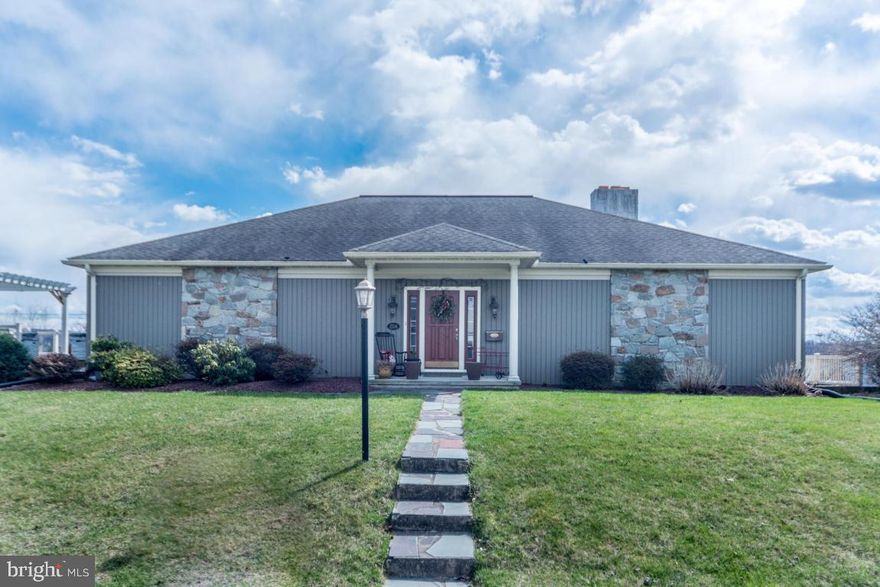 One step inside this captivating Strasburg home and you may not want to step back out!  It's sprawling quality boasts meticulously maintained hardwoods, wet bar & stone wood-burning FP in sunken great room, seemingly endless granite kitchen counter tops, 1st flr master suite, w/ whirlpl tub,  guest suite w/ private bath, den w/2nd stone FP, exercise room, office, game room, landscaped heated in-ground pool, outdoor spa & geothermal/solar heating!