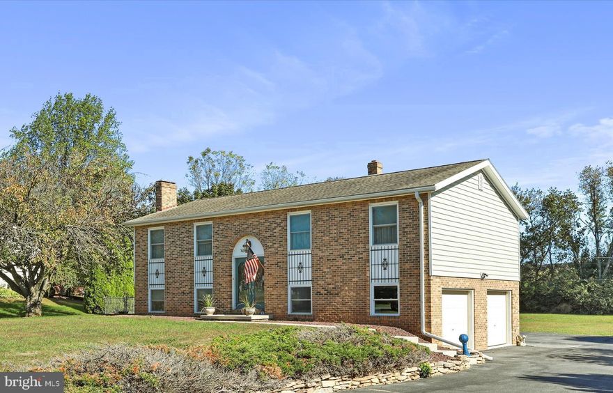 Welcome to your new home! Tucked away at the end of a cul-de-sac, this lovely home offers the perfect mix of comfort, space, and modern updates — all on over half an acre of land. The upper level features three spacious bedrooms, a beautifully updated full bath with marble flooring and a jetted tub, plus a convenient half bath in the primary bedroom which is also beautifully updated. The kitchen has been refreshed with hickory cabinets and corian counters. It extends to the dining area, which flows seamlessly into the living room — making it easy to cook, dine, and relax all in one connected space. Off the dining area, sliding doors lead to a large composite deck with retractable awning overlooking the private backyard — perfect for morning coffee, evening dinners, or weekend get-togethers. The finished lower level offers plenty of flexibility — it  offers expansive space which can be used as a fourth bedroom, a cozy family room, or a fun rec room, a half bath and doors leading out to a patio covered by the deck. You’ll love having both an attached two-car garage and a detached all-brick two-car garage, giving you extra space for vehicles, hobbies, or storage and fenced side yard convenient for the pets. There's also the possibility of installing a wood stove in the main level living room AND detached garage. Updates throughout the home include vinyl siding, kitchen and bath upgrades, flooring, composite deck, new hot water heater in September and more! With its peaceful setting, spacious lot, and thoughtful updates, this home truly has something for everyone! Measurements approx.
