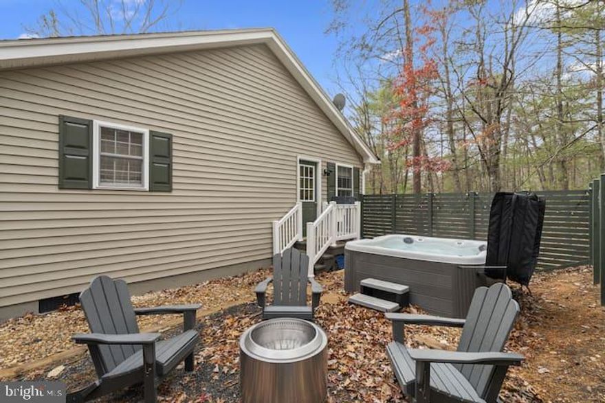 Welcome to Picard Place. This luxury 3 bed, 2 bath Chalet is peacefully situated 3 minutes from the Bryce Ski Resort & sleeps up to eight. Complete RENOVATION; fresh paint, comfortable & luxury furnishings, new kitchen, etc. And should you choose to venture out for adventure you’ll find yourself just 3 mins away from a great resort offering mountain biking, golf, winter sports, & scenic chair lift rides. Or pop over to Lake Laura (8 mins) for water activities or a stroll along the lake.
The space
Inspired by a minimalist yet modern lifestyle, your Picard Place is a charming 3 bedroom, 2 bathroom chalet 3 minutes from Bryce Resort. It is completely surrounded by the fresh mountain air and the beauty of nature at its best. This home was thoughtfully designed to make you and your guests feel relaxed and comfortable. The space is perfect for a family, group of friends or even a couple’s getaway. With free high speed Wi-Fi and dedicated work areas, Picard Place is perfect for remote work too.

You will open the door and enter the tastefully decorated main living area where you have access to all of your modern comforts such as; personal Alexa, smart tv, fireplace, touchscreen thermostat and more. Hang out in the living room or find your Zen in the newly added sunroom addition. A full 4 season space with pull out couch and swing couch.

The kitchen is an absolute showstopper. This modern design is a perfect blend of form and function. The fully stocked kitchen is ready for a quick meal or 7 course masterpiece, whatever your heart desires. Ask Alexa for cooking/baking ideas.

To your right, you will find the master bedroom with full bath and smart tv. Big enough for your private space or to crash after a full day in Shenandoah Valley. A baby pack and play is available for your little one. Across the hall you will find two bedrooms that share a full bathroom. Choose between a queen bed or two twins. Your dedicated work station is on the main floor surrounded by beautiful views of the mountain and nature.

Outside you can enjoy the beautiful deck with your choice of gas or charcoal grill. You will love to unwind on the deck with a favorite beverage. Take it easy, inhale, exhale, and listen to nature’s sounds.

Or relax your sore muscles in our new hottub. Use jets to relax, drink holders to REALLY relax and enjoy the mountain air while staying a toasty 104 degrees. Use our solo stove fire pit stay warm in those cold mountain nights and don't forget to take your favorite selfie in our outside zen space. You will absolutely never want to leave!

To make your entry as easy as possible, we use the keyless entry system. There is ample parking in front of the house area as there are no assigned parking spaces. You can easily up to 3 cars.