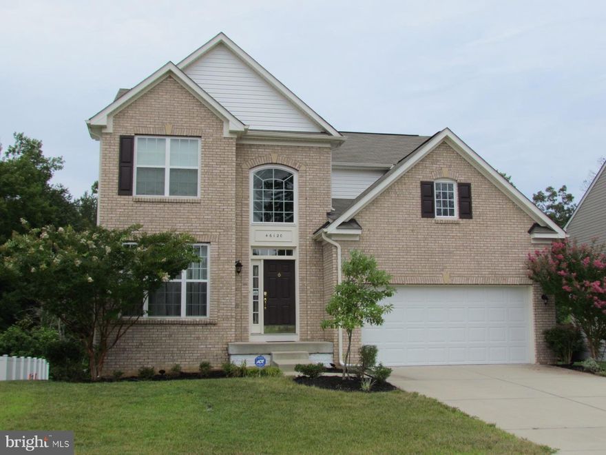 Almost 4,000 square feet! Stunning brick front 5 bedroom 3 1/2 bath w/ finished walk out basement. Upgrades include SS appliances, maple cabinets and 2 story foyer. Eat-in kitchen opens to the family room and formal living room. Master Suite w/ cathedral ceiling, large walk-in closet and jetted tub. Finished basement has open living space, bedroom, full bath and loads of storage.Includes garage and deck.