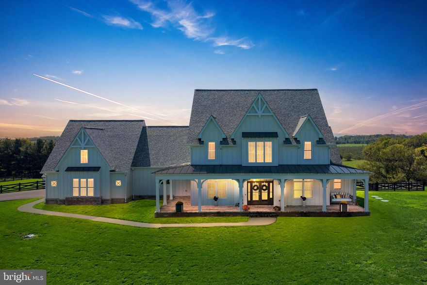 Super Modern 2022-built  Gothic Style farmhouse sitting on 21 acres of pristine land with an 18 by 36 inground gunite saltwater pool and automated cover!! LARGE WALK-IN ATTIC FOR STORAGE. The house sits on a hill giving you a 360-degree view of the Blue Ridge Mountains. An elegant cement walkway leads you up to the covered wrap-around front porch. Step into the two-story foyer with a staircase leading to the upper level and a generous-sized formal dining room to your left. Opulent scratch-resistant Luxury vinyl plank throughout the entire main level!! Enter the Eat-in Gourmet kitchen through the dining room with granite countertops, a large center island, a marble backsplash, under cabinet lighting,  an enormous walk-in pantry, stainless steel appliances, a farmhouse sink, a pot filler, soft close cabinets and drawers, and a breakfast nook with built-in Banquette seating. Large home office just off the kitchen with its own mini-split ceiling unit perfect for anyone who works from home. High-Speed Internet is offered by two different providers!! Next to the home office, you'll find the entrance to the two-car garage with an upgraded custom garage door, extra high ceilings, and a 240V Electric Car Charging Outlet. The kitchen opens up into the family room with a wood-burning fireplace, and two sliding glass doors leading to the covered stamped concrete patio and pool with fencing on both sides overlooking the countryside. Main level primary bedroom with an exposed wood beam, cathedral ceilings, his and her walk-in closets, french doors leading to the pool and patio, and an en-suite luxury spa with tiled floors, an enchanting two-person stand-alone tub with a wall heater, a dual-sink vanity with granite countertops, soft close drawers, and a voluminous shower stall with tiled floors and walls running almost the entire length of the room. Just off the primary bathroom, you'll find the laundry room with a dog shower!! Another nice-sized bedroom on the main level with built-in shelves, and an en-suite bathroom with granite countertops, soft close cabinets and drawers, and a frameless shower with tiled walls. Ascend the staircase with thick and plush carpet where you'll land in the loft area/Media room . Two more spacious ensuite bedrooms on the upper level both with granite countertops, soft close cabinets and drawers and a tub/shower. UPDATES AND UPGRADES NOT MENTIONED IN THE DESCRIPTION: Nine-foot ceilings throughout. Gated Access Powered by Solar & Battery Storage. 2x6 Exterior Walls with Upgraded Insulation. Automatic Dog Door with Collar System.Culligan Water Softener System. Google Video Doorbell.Two Nest Wi-Fi Smart Thermostats.Two Outdoor Swing Beds with Mattresses.High-Quality CertainTeed Roof Shingles.Partial Metal Roof. Walk-in Storage Area in Attic.NO HOA!! THIS IS THE ONLY LOT IN THE SUBDIVISION THAT ALLOWS HORSES. NINETEEN OF THE TWENTY-ONE ACRES ARE IN LAND USE MAKING THE PROPERTY TAXES EXTREMELY LOW!!!! Shops restaurants, and I-81 are very close!! THREE HOUR NOTICE IS REQUIRED TO VIEW THE PROPERTY!!! Audio and Visual Surveillance on the Front Porch!!!