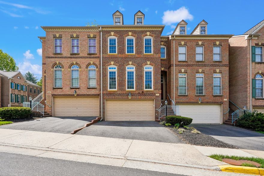 WELCOME HOME to this elegant BRICK FRONT townhome with a TWO CAR GARAGE.  Centrally located but tucked away in a quiet spot in the neighborhood.  The owners have kept up this home in PRISTINE CONDITION!  Beautiful hardwood floors in the entryway and main level (family room upgraded to hardwood in 2015) and also featuring custom crown moulding and trim throughout. You will love the high ceilings and loads of natural sunlight! The family room is open to the formal dining room  with plenty of room for entertaining. The kitchen has a WOLF GAS COOKTOP,  stainless steel double oven (2015), stainless steel refrigerator (2020) and new dishwasher (2026) - and the island conveys!  Plenty of space for an additional eat-in table! Walk out to the trex deck for outdoor dining!  The upper level features three bedrooms and two bathrooms. The primary bedroom has cove ceiling, large closets and an en suite bathroom w/ separate shower, soaking tub, separate his and her vanities and a private water closet.  The additional two bedroom are a generous size and share the updated hall bathroom.  The washer and dryer are on the upstairs level ( brand new in 2025) - such a great convenience!  The lower level has a cozy gas fireplace, built in bookshelves and space for an additional family room, home office, home gym - the possibilities are endless! This level also features a FULL BATHROOM.  Walk out to a FENCED IN BACKYARD (fenced replaced 2016)! THIS HOME HAS IT ALL!!   It also features SOLAR PANELS which have been fully paid for (no lease or remaining payments- see agent docs for more info). In the garage, there is an EV CHARGER and is pre-wried with an additional 220v line for a second EV charger.    UPDATES ALSO INCLUDE - ROOF (2022) WINDOWS (2021), SOLAR PANELS (2023), HVAC (2016) w/ STEAM HUMIDIFIER, WATER HEATER (2016).