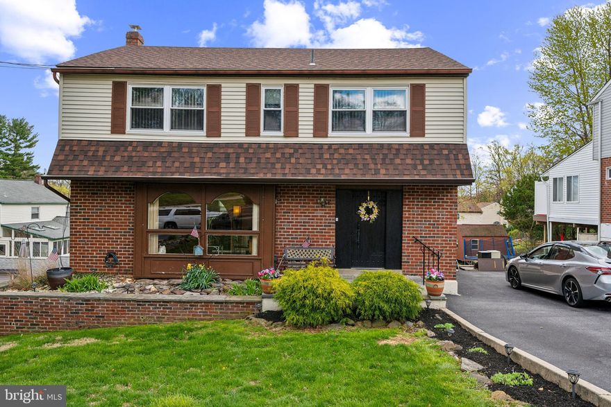 Welcome home to 57 Woodlawn! Located on a quiet, non-Cut Through street, this home boasts 4 bedrooms and 2.5 baths and hardwood floors throughout. The first floor offers a large living room with lots of natural light from the oversized front window. Formal dining room it's perfect for having guests. The dining room leads to a family room addition which leads to a Covered rear deck with a skylight and ceiling fan so you can enjoy the outdoors. The kitchen which was updated in 2017 with new cabinetry and appliances and beautiful granite countertops. There is a convenient half bath off of the kitchen. The second floor has four great size bedrooms all with Great closet space. The main bedroom also has a full bath with a stand up shower. Pull downstairs to floored attic space for extra storage. The full walk-out basement includes sliders, which exit to the large rear yard. The space is unfinished, but can easily be finished to add additional living space. There is a large double wide driveway for plenty of street parking, other upgrades to this home include new roof 2020, new heater, 2023, 200 amp service, Central air 2018. Located in the heart of Broomall, in the highly desired school district of Marple Newtown, also close to some of the area's top private schools. This home is within walking distance to the high school, public transportation, and more. Easy access to all major routes, and a short walk or drive to shopping, dining, etc..