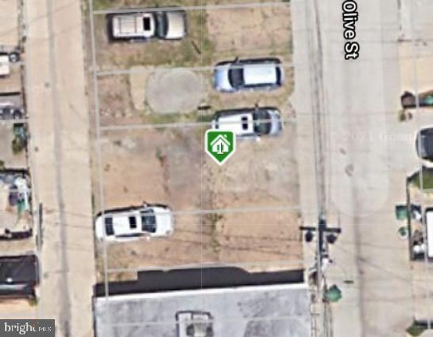 Vacant Residential building lot ready to build. 16' 10" x 40' with road access from front and back of lot. See public records for exact location of lot.