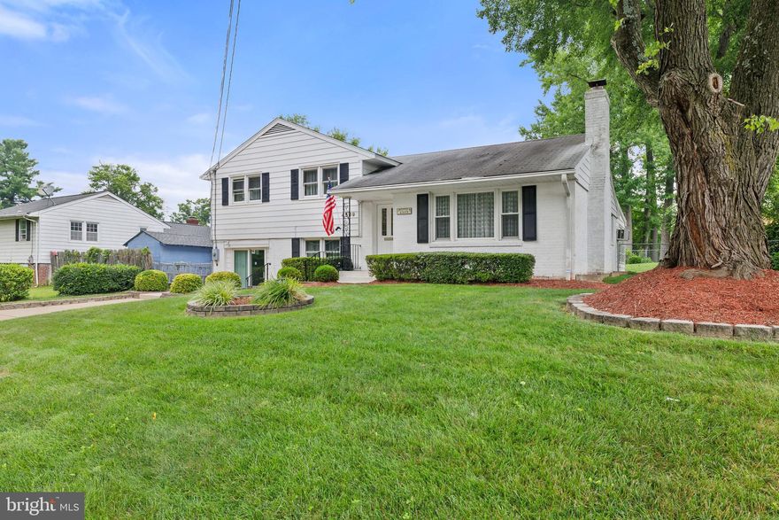 Expanded split level home in the convenient Crestwood Manor community offers great space for daily living & entertaining! Original hardwood flooring and an attractive wood fireplace in the living room grace the main level and set the mood for comfortable and stylish living! Enjoy the hot tub, skylights and ceiling fan in the rear family room/sunroom addition; it will be your favorite space to get a start on the new day with a satisfying cup of coffee or relax at the end of the day with a cool beverage! Three generously-sized bedrooms along with a full bathroom on the upper level. The walk-out lower level increases the functionality of this nice home with a comfortable recreation room; large bedroom with walk-in closet; full bathroom and laundry/storage/workshop area! Nicely landscaped & maintained yard with full rear fencing and large shed on concrete pad! Upgrades include: A/C air handler 2020 & hot water heater 2021. Plenty of nearby shopping, dining & entertainment possibilities! Quick access to major commute routes including I-495; Rt236 & Metro bus straight to the Pentagon! Schedule a showing today!