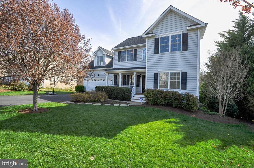 Move Right In! Picture perfect 4 bedroom colonial with 3 finished levels! Wood floors on the main level*Newly renovated kitchen with white cabinets and stainless steel appliances including gas stove*Full walkout basement with finished rec room! Fenced in rear yard backing to wooded common area*NEW roof! Dual zone HVAC and both units are newer! Enjoy community pools/tennis and public golf course*