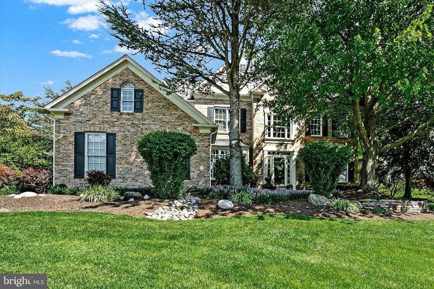 Welcome to 12 Millers Road, where impeccable custom craftsmanship meets the perfect canvas for your personal touch, making this your forever home. Nestled on a private lot in the sought-after Eagleton Farms, this property stands out with unique features like a coffered ceiling, a stunning fireplace surround, and a custom walk-in pantry. The expansive lower level boasts 9-foot ceilings, a cherry wood wet bar complete with a twin kegerator, wine fridge, and ice maker, custom cabinetry, as well as a pool table, full bath, and home gym/5th bedroom.
<br><br>
Throughout the home, you'll find exquisite custom wood trim, a recently updated deck, a Pennsylvania Blue slate patio featuring a hot tub, and a serene koi pond set amid mature landscaping. The gourmet kitchen showcases cherry cabinetry, granite countertops, a GE Profile gas cooktop and double oven, and a decorative tile backsplash. The living room is anchored by a fireplace with a custom wood mantel and built-in bookcases. There are newer plantation shutters on most of the first floor, and in the main bedroom suite. The Pella sliding doors on both levels have built-in mini blinds.
<br><br>
The dramatic two-story family room is flooded with natural light, and the entire first floor impresses with gleaming hardwood floors and 9-foot ceilings. Hardwood floors continue up the staircase, across the landing, and into the main bedroom suite, which features a decorative fireplace. The freshly painted Jack and Jill bedrooms share a bath, while the guest suite enjoys a private bath. 
<br><br>
Additional highlights include a magnificent first floor library with desk/wall unit, an oversized three-car garage with storage above, and a spacious deck that overlooks breathtaking, very private open space. Don’t miss out on this exceptional property—schedule your tour today!