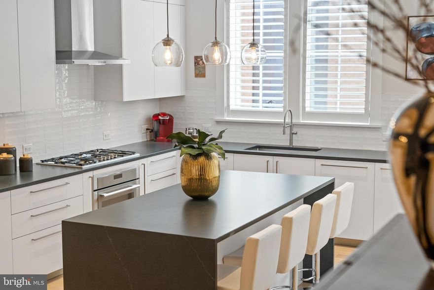 Like-new townhouse in Old Town’s Robinson Landing. Fresh, modern design invites new beginnings, uncluttered thinking and effortless living. Bright, open views from over-sized windows stream sunlight throughout the home. Thoughtful consideration has been given to every detail. Multiple indoor and outdoor rooms create your choice of living options with 3 bedrooms, a private office or optional fourth bedroom, and a top floor family room. The main level is home to an open floor plan featuring a living with gas fireplace, dining room, kitchen with Snaidero cabinetry and access to a private deck conveniently located off the kitchen. Watch amazing sunsets from the roof deck with outdoor kitchen. Located along Old Town's vibrant waterfront and just 3 blocks to the shops and restaurants of King Street. The award-winning, waterfront community of Robinson Landing offers the best in amenities and Old Town living. Enjoy concierge service, 24-hour on-site staff, fitness center, yoga studio, pet grooming spa, elegant amenity building lobby, club room, library and resident lounge with Potomac River views. Work out in the Robinson Landing gym while looking over the Potomac River, then grab a coffee at the cafe located on the promenade in front of the building. Take a stroll along the waterfront, dine on the pier, Barca or Ada's or enjoy a multitude of activities available in Old Town. Convenient to Reagan National Airport, Amazon's HQ2, Capitol Hill, the White House and all metro D.C. has to offer.