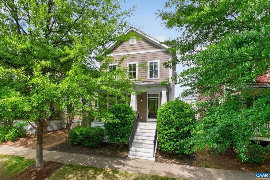 Crozet. Old Trail. Located just steps away from the Village Center with shops, gym, restaurants and various businesses. Built by Peak Builders, this home features a spacious open floor plan with details like solid doors, solid hardwood floors, heavy trim, quality windows, and more. The main level is wide open front to back with 9' ceilings. Spacious dining room up front, kitchen with island and stainless appliances, and large family room in the back with 2 sided fireplace and covered deck off the back. The primary suite is on the 2nd floor with tub, shower, and lots of tile and trim. Bedrooms 2 and 3 share the 2nd bath on this level. Downstairs is a spacious rec from plus a bedroom and full bath. The garage is accessed off the alley behind. Walkable to the nearby schools, great trail system, optional pool and golf memberships available in the community.,Granite Counter,Fireplace in Family Room