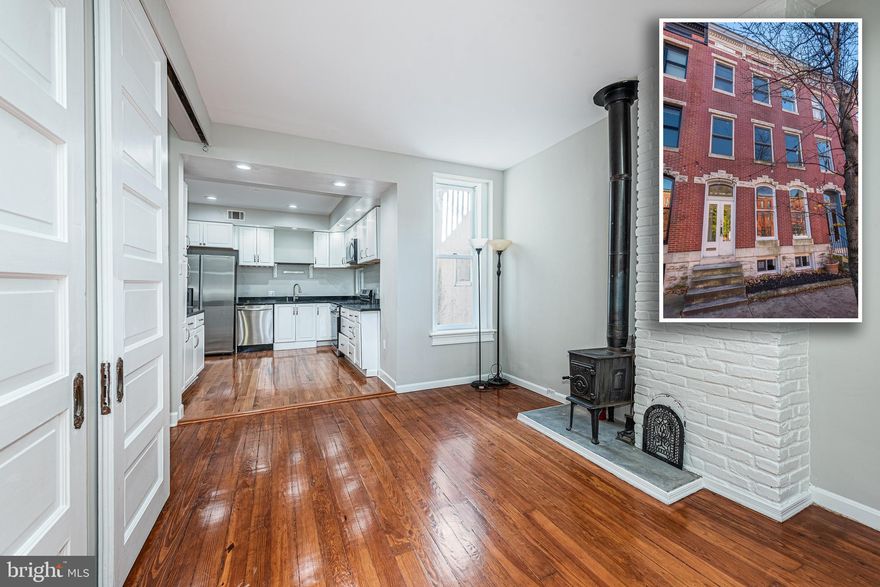 UNBELIEVABLE OPPORTUNITY TO OWN THIS 3 UNIT ROWHOME WITHIN WALKING DISTANCE TO JOHNS HOPKINS!  Main level unit has a spacious living room, kitchen, 2 bedrooms and 1 full bath and in unit laundry.  The 2nd & 3rd level unit is newly renovated with gleaming hardwood floors, a gourmet kitchen with ss appliances & granite counters, a primary bedroom suite with a full bath, an additional bedroom with a hall bath, and a family room.  The basement unit is also newly renovated with wood laminate flooring, an updated kitchen with ss appliances & granite counters, a living room, large bedroom, full bath, and laundry area.  There is a shared private rear patio with steps leading to the 2 tiered rooftop deck with sweeping views.  With proximity to Johns Hopkins, this property is a no brainer!