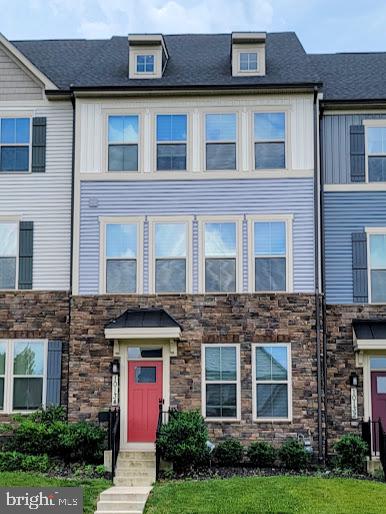 Welcome to this stunning 3-bedroom, 2 full bath, and 2 half bath home in the sought-after Lake Linganore community offers modern design, thoughtful upgrades, and a prime location. Step inside to an inviting open floor plan, where the gourmet kitchen steals the show with quartz countertops, stainless steel appliances, a gas range, and a sleek light range hood. The spacious island overlooks the dining and living areas, creating the perfect setup for entertaining. Just off the main living space, step outside to your private covered lanai, where you can sip your morning coffee while enjoying the peaceful view. On the upper level, the primary suite is a true retreat, featuring a huge walk-in closet and a spa-like en-suite with a double vanity and oversized shower. Two additional spacious bedrooms share a well-appointed hall bath, while the convenient bedroom-level laundry adds ease to daily living. The fully finished basement offers even more space, featuring a large rec room and half bath with direct access to the new 2 car garage. Enjoy Lake Linganore’s resort-style amenities, including private beaches, multiple pools, scenic hiking trails, playgrounds, and a community lake perfect for kayaking and fishing. Conveniently located near top-rated schools, shopping, and major commuter routes, this home is the perfect blend of modern comfort and an active lifestyle. Don’t miss this incredible opportunity—schedule your showing today!