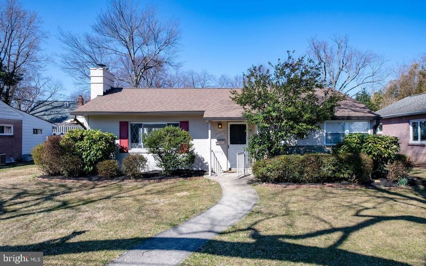 Adorable bright rambler perfectly situated near Forest Glen Metro. Step inside to a welcoming foyer with a coat closet that opens to a spacious living room, complete with a cozy stone fireplace and an expansive picture window framing views of the beautiful front yard. The generous separate dining room features cathedral ceilings and two large windows that fill the space with natural light and a door to the screened-in rear porch—an ideal setting for gatherings. 

The main level offers three comfortable bedrooms, a renovated full bath, and a kitchen with granite countertops. Refinished wood floors, fresh paint and generous closet space throughout add warmth and character.

The fully finished lower level expands your living options with an office, two additional bonus rooms, a second beautifully renovated full bath, and a convenient kitchenette/wet bar—ideal for guests, extended family, or recreation. Ceramic tile flooring and recessed lighting create a bright, inviting atmosphere throughout the spacious lower level.

Enjoy outdoor living on the screened‑in rear porch overlooking the wonderful backyard, with plenty of room to relax, garden, or play. This delightful home brings together comfort, convenience, and flexibility in a fantastic location, with separate, comfortable living areas on each level that work wonderfully for multigenerational households.