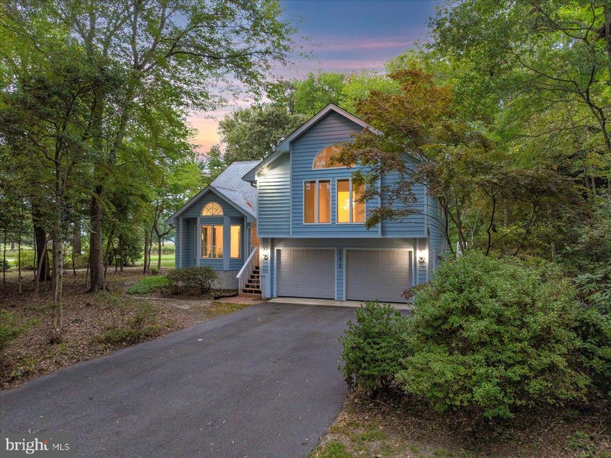 Significant Value Adjustment...Welcome to 11410 Gaskin Dr, Berlin, MD — a spacious and serene retreat nestled on the Seaside Course at the Ocean City Golf & Yacht Club. Built in 1988, this freshly painted 2,852 sq ft home with new carpet offers 3 bedrooms, 3 full bathrooms, and a wonderful opportunity to make it your own. The main level features an oversized living room with beautiful hardwood floors and a bay window overlooking the golf course, a formal dining area with French doors that open to a large sundeck with sweeping fairway views, glimpses of the waters off Newport Bay, and stunning, picturesque sunsets. The eat-in kitchen features ceramic tile flooring, granite countertops, counter seating, and a sliding window that opens to the screened-in porch—perfect for enjoying the outdoors in comfort. From various points throughout the home, including the sundeck, screened porch, and rear yard, you'll enjoy tranquil pond views set along the golf course, adding to the peaceful, scenic atmosphere. Upstairs, the generous primary suite is highlighted by a dramatic arched window that provides golf course views and offers a timeless design element that fills the space with natural light, along with two additional bedrooms and a full hall bath with tub. The lower level includes a spacious second family room with fireplace, hardwood floors, sliding doors to a patio and gardens, a full bath, and a separate laundry room. The .67-acre yard is a tranquil, park-like sanctuary with mature trees, meandering paths, and visits from deer, blue herons, ducks, geese, and songbirds. Additional features include a two-car garage with dual doors and a bump-out workspace, plus a generator for added peace of mind. Located just minutes from Ocean City beaches, Assateague Island, public boat ramps, West Ocean City shopping and dining, and historic downtown Berlin, this home offers the perfect blend of comfort, nature, and coastal lifestyle. Now offered at $669,000 — a $50,000 price improvement! Take advantage of this incredible new value.