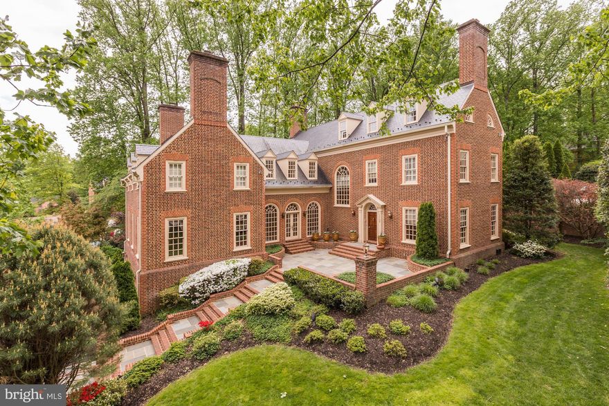 A gorgeous and elegant Eugene Cullinane Colonial enhanced with a well designed floor plan that is bright, versatile and sun-drenched throughout. This inviting space is ideal for formal entertaining and everyday living. From the attractive hardwood floors,  crown molding, high ceilings and unique architectural elements, no detail has been compromised.  The main level features a number of spacious rooms, many of which provide access to the exterior space, including a charming living room, formal dining room, and a relaxed family room - each with a fireplace! Enjoy cooking for family and guests in the open, two-story gourmet kitchen featuring high end appliances, an island with a gas cooktop, and prep area/ butler's pantry. The luxurious primary suite is the ideal retreat with a spa bath, marble floors, skylights, soaking tub, walk in closets and private washrooms that lead to a dual shower. The walkout lower level highlights a second family room with a fireplace and wet bar, a home gym with sauna and shower, and a kitchenette. The beautifully landscaped and hardscape exterior space is an extension of the home featuring an expansive terrace, perfect for dining al-fresco, a pool, loggia, and three-car, side-load garage. This home is convenient to Scotts Run Nature Preserve, Mclean, Tysons and several commuter routes to DC and MD including 495, 123 and 66.