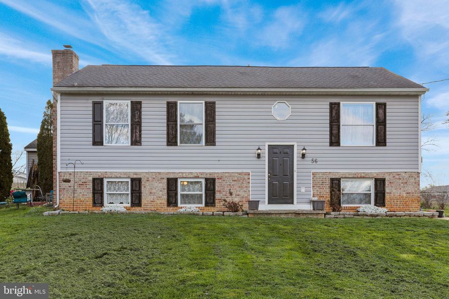 This 4 bed, 2 bath split-foyer is the perfect starter home located in Ranson just minutes from shopping and the Rt. 9 Bypass.  The upper level has a gourmet kitchen with 42"oak cabinets, granite counter tops and a ceramic tile floor.   French doors in the kitchen lead to a 16 x 16 deck for outside enjoyment.  For spaciousness, the living room and kitchen share a vaulted ceiling allowing plenty of natural lighting in.   Also on the upper level there are 2 bedrooms, one is the oversized primary with his/hers double closets & a vaulted ceiling. The lower level has 2 additional bedrooms, a full ceramic bath, a separate laundry room and a large family room with built in shelving.   A well-designed floor plan offers a separate entrance for 1 lower bedroom.  An additional bonus is a detached 24 X 16 workshop in a nice level backyard.  Schedule your showing today!