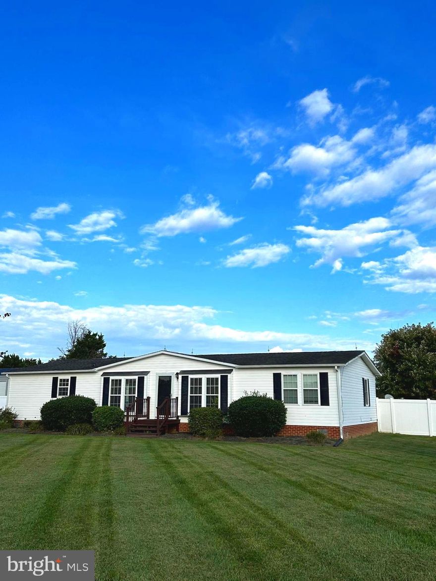 Country Living at its finest!! Enjoy easy one level living on this beautiful country setting!  large level 1 acre lot with fenced in rear yard. Detached 2 car garage with electric. (oil furnace not working in garage).  spacious 3 bedroom 2 full bath manufactured house. Owners suite has large bath with double sink vanity, shower, and separate jetted heart shaped soaking tub! formal living room, separate family room, generous eat in kitchen. large deck overlooking well manicured back yard. garden shed and more. priced to sell!!!