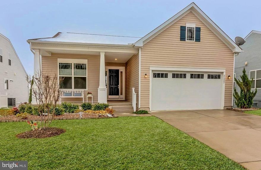 Enjoy true peace of mind with included community lawn maintenance—no more weekend yard work to worry about. Your new home is nestled in Four Seasons at Belle Terre, a vibrant 55+ community offering exceptional amenities and a welcoming, resort-style lifestyle.

Begin your visit on the inviting, large covered front porch, beautifully sealed with Hello Garage coatings. Step inside to an open, light-filled floor plan featuring 3 bedrooms and 2 full baths. The gourmet kitchen shines with upgraded GE Profile appliances, including a double oven and 5-burner cooktop, and a spacious island perfect for meal prep or casual gatherings. The sunroom and the screened-in porch both overlook a tranquil pond with a fountain—providing a peaceful backdrop and the soothing sound of water. This home is upgraded with solar panels for significant savings on electric bills.

Additional features include a full unfinished basement with rough-in plumbing for a future bathroom, offering endless possibilities for storage or expansion. The garage is wired with an EV charger, and the outside trash can enclosure  allows for  extra space. All gutters have LeafFilter Gutter Guards for worry-free maintenance.

Residents of Four Seasons at Belle Terre enjoy meaningful connections at the magnificent 6,000-square-foot clubhouse, complete with billiards, pool tables, a fitness center, and a full-time activities director who ensures there’s always something fun happening. Stay active on the pickleball and bocce courts, take a refreshing dip in the Olympic-size swimming pool, or explore the walking trail that winds through the wooded perimeter of the community.

Beyond the amenities, Four Seasons at Belle Terre offers a premier location close to everyday conveniences. You’re just minutes from shopping, dining, entertainment, and the beautiful Delaware beaches. Spend your days strolling through Cape Henlopen State Park, exploring Lewes’ rich maritime history, or simply embracing the relaxed coastal lifestyle this area is known for.

This home offers low-maintenance living, outstanding amenities, and an ideal coastal setting—everything you need to enjoy life to the fullest.