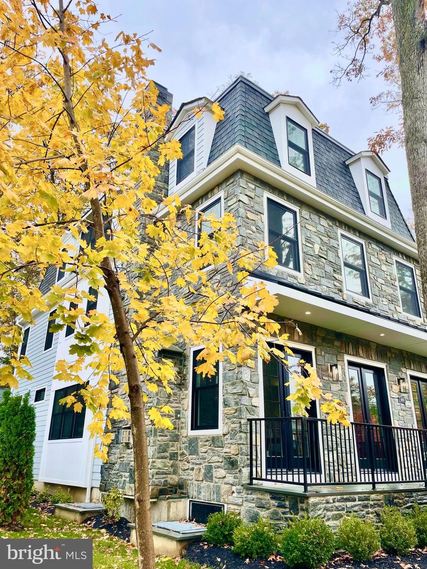 Spectacular new construction in a very desirable location in Chestnut Hill. Fabulous living floor perfect for today's modern lifestyle. Spacious living room with gas fireplace with marble surround and custom millwork, beamed ceiling and gorgeous French doors. Center formal dining room perfect for entertaining and holidays. A true Chef's Eat-In Kitchen featuring Sub-Zero/Wolf appliances, custom cabinetry, quartz countertops, island with seating for 3-4, wine refrigerator with open shelving ideal for entertaining. Access to the rear mud room with coat closet plus convenient powder room. Ascend to the Primary floor oasis encompassing the entire second floor. Spacious 22x14 Bedroom with sitting area. Runway-style hallway leads to dual walk-in closets with custom built-in shelving and drawers opening to a huge spa-like bathroom with oversized step-in shower with bench, custom dual vanity, luxurious freestanding soaking tub, separate water closet and linen closet. Convenient laundry room with side by side washer/dryer and utility sink plus sitting room or home office complete this floor. Third floor features a lovely guest suite with a walk-in closet and en-suite bathroom. Two additional bedrooms each with walk-in closets and a shared marble bathroom plus a second laundry room. Optional 4-stop elevator runs from the finished lower level all the way up to the secondary bedroom floor. Finished lower level with huge bonus room with wet bar ideal for media room/home office/home gym/playroom with powder room plus guest quarters with a 5th BR with en-suite bathroom perfect for au-pair or in-law quarters. 2 car garage. Located in the heart of Chestnut Hill, this magnificent schist stone home is just a short stroll to multiple train stations as well as the shops, markets and restaurants on Germantown Avenue. 25 minutes to Center City, easy access to the suburbs, transportation, major highways and Fairmount Park. 10 year property tax abatement estimated at approximately $2000/year. Truly exceptional home in a lovely enclave of this charming and historic section of Philadelphia.