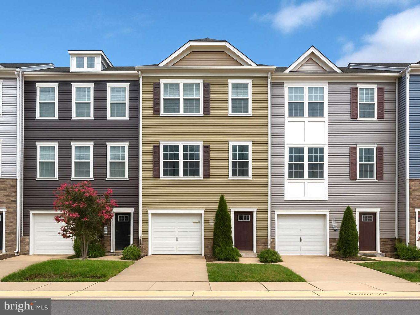 Modern Townhome with Rare Entry-Level Suite in Severn.
Welcome to 7735 Venice Lane — a beautifully designed 2018 townhome offering 3 bedrooms, 3.5 bathrooms, and over 2,200 sq. ft. of versatile living space.
The main level features an open-concept layout with luxury plank flooring, a spacious living area, and a sunlit dining space. The chef’s kitchen boasts quartz countertops, an oversized island, stainless steel appliances, and rich brown cabinetry. Off the kitchen, step onto the deck for morning coffee or evening grilling.
Upstairs, the primary suite offers a walk-in closet and spa-style bath with dual vanities and upgraded finishes. Two additional spacious bedrooms with shared full bath, along with convenient upper-level laundry complete the top floor.
On the entry level, you’ll find a private room/office with a full bath — ideal for guests, multigenerational living, or a quiet home office.
Additional highlights include:
* Attached 1-car garage + driveway parking
* Energy-efficient systems (built in 2018)
* Low-maintenance exterior and HOA
* Close to Fort Meade, NSA, BWI, MARC train, and major commuter routes
This home blends modern style, flexible living spaces, and a prime location. Move-in ready and apply now!