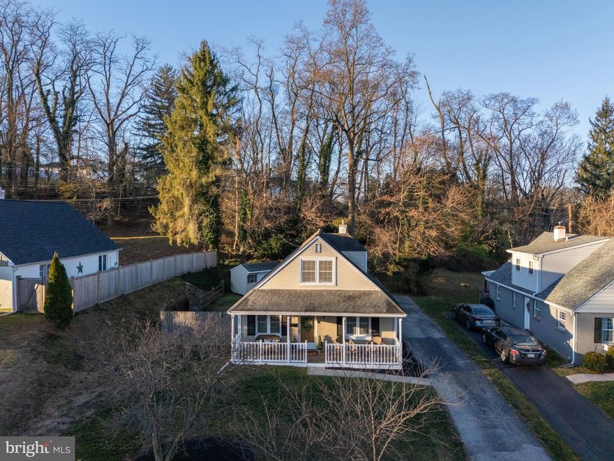 Updated, incredibly stylish Cape Cod home with the coolest backyard! 734 Marshall Dr exudes charm inside and out, set in a coveted location where you can walk into West Chester Borough to enjoy an array of shopping, dining and festivities. This delightful home in the award-winning West Chester Area School District offers a covered front porch that leads into an incredibly bright and spacious floorplan boasting not just one – but two bedrooms on the 1st floor. Each and every space from the kitchen to the bathrooms is updated and beautifully styled, ready for you to move in and fall in love. The main floor living spaces flow seamlessly from an expansive front living room through to the dining room and kitchen, with both bedrooms and a stunning full bathroom tucked at the back of the home. There are 2 more bedrooms upstairs as well as another full bathroom and a walk-in closet that boasts convenient hallway access. A fully finished basement allows for ample opportunities to expand your living space by creating a home office, game room, workout space or more – and it also features a convenient powder room as well as the laundry. Be sure to visit the backyard which is a delightful and unique outdoor space. The gently sloping yard offers multiple stretches of flat open space, starting with a fenced-in area near the house. There’s also a “next level” seating area for al fresco  dining or stargazing, and the whole yard culminates in an “upper level” deck under the trees. What a cool and attractive space for entertaining or nature watching! This truly unique home is situated on a picturesque, tree-lined road with convenient access to the West Chester Bypass while also offering a high walkability score. Marshall Square Park is an easy stroll away, along with all of those Borough amenities. 734 Marshall Dr is a turnkey home that’s sure to impress. Request a personal tour today!