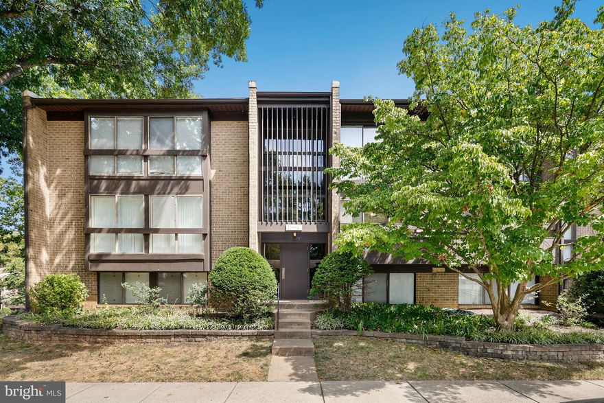 Welcome home to this charming, light-drenched 2-bedroom, 2-bathroom split-level condo with thoughtful modern updates and a mid-century modern design feel. You will enjoy the serenity of forest views from the living and dining rooms that are beautiful and peaceful in every season. This residence boasts several recent upgrades, including a 2020 HVAC system, a 2021 electric panel upgrade, and new carpeting installed in 2018. The kitchen and bathrooms all reflect modern upgrades, overhead lighting fixtures were added in the bedrooms and living room, and crown molding installed in the main living areas for added elegance. The primary bedroom features a California closet for organized storage and the laundry room boasts built-ins and lighting for convenience and organization.The main living space is further elevated by an upgraded marble 2-sided fireplace and custom french doors at both kitchen entrances. The condo fee covers water, trash and recycling expenses, simplifying your monthly bills. Stay connected with wired Verizon FIOS or Comcast Xfinity. With its split-level layout and oversized windows, this condo offers abundant natural light and a welcoming atmosphere. The building connects to the Reston Association Trail system and is a 5 minute drive to the Reston Metro and less than 10 minutes to Reston Town Center shopping and dining. As a bonus, one covered reserved parking space is included in the price, and ample additional parking spaces are available in the open lot. Don't miss this fantastic opportunity – schedule your viewing today!