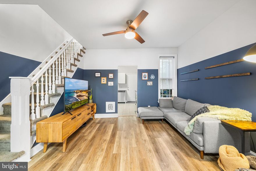 Step up to your storybook Philly front porch — ideal for morning coffee, golden hour hangs, or soaking in a little sunshine. Inside, the open living/dining space features a cozy decorative fireplace and just the right vibe to kick back or entertain.
The modern kitchen shines with stainless steel appliances and granite countertops — perfect for midnight snacks or weekend brunch. Out back, there’s space to grill, chill, and grow your herb garden dreams.
Upstairs, you’ll find three nicely sized bedrooms and a stylish full bath with a shower/tub combo that’s as functional as it is fresh.
Need more space? The clean, painted basement handles storage and laundry like a pro — because adulting should be easy. But the real cherry on top? Location. You’re just a short stroll from East Fairmount Park, where you can watch the rowers glide by, hit balls at the Strawberry Green Driving Range, or wander leafy trails that make you forget you live in the city. It’s the perfect balance — a little bit of green, a little bit of city, whether you're a social city kid or a low-key residential hermit (we don’t judge). Close to public transit and the highway, this spot makes getting anywhere a breeze. Come see 1542 N Hollywood — your next chapter starts here.