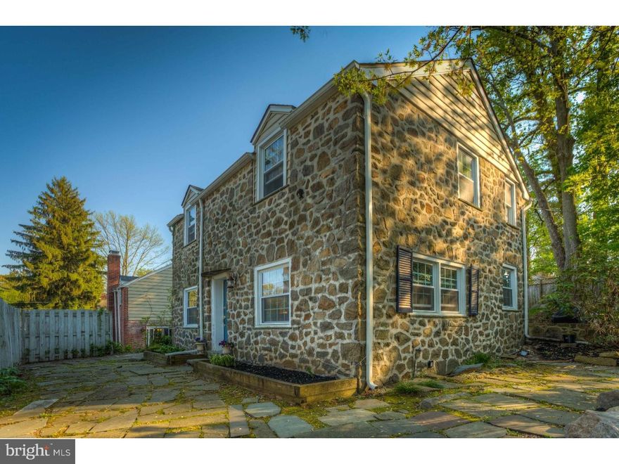 BACK ON THE MARKET...due to Buyer's Contingency...so if you missed out on this wonderful home before, now is your chance to own this absolutely adorable 2 story Hansel and Gretel stone colonial within walking distance to downtown Wayne. From the minute you enter this gem there is a welcoming feeling that will come over you as the walls have been opened up creating an expansive feel between the Kitchen, Breakfast and Living Rooms. The country Kitchen has white cabinetry with granite countertops, and Breakfast Bar with pendant lighting that opens directly to additional Dining Space. It's Coastal Living ambiance flows directly into the lovely Living Room with cozy fireplace, gleaming hardwood floors and deep window sills. Gracefully tucked around the corner is very private Den tv viewing space that completes the First Floor along with a charming Powder Room. The Second Floor has an amazing Master Suite with soaring ceilings not found in many other similar priced homes. This is a true oasis with exquisite Master Bath and walk-in closet along with sliding doors that lead to a wonderful private Deck. The Second Floor has two additional Bedrooms and recently updated Hall Bath. There are stairs that lead to additional attic storage space. The square footage of the house continues into the finished basement with brand new carpeting and a separate Laundry Area. This wonderful home is oozing with charm and has a one car attached Garage. Finally an affordable stone colonial with a Walk to Wayne location, that backs up to the Wayne Art Center and Radnor Trail...don't miss it...it doesn't get any better!!