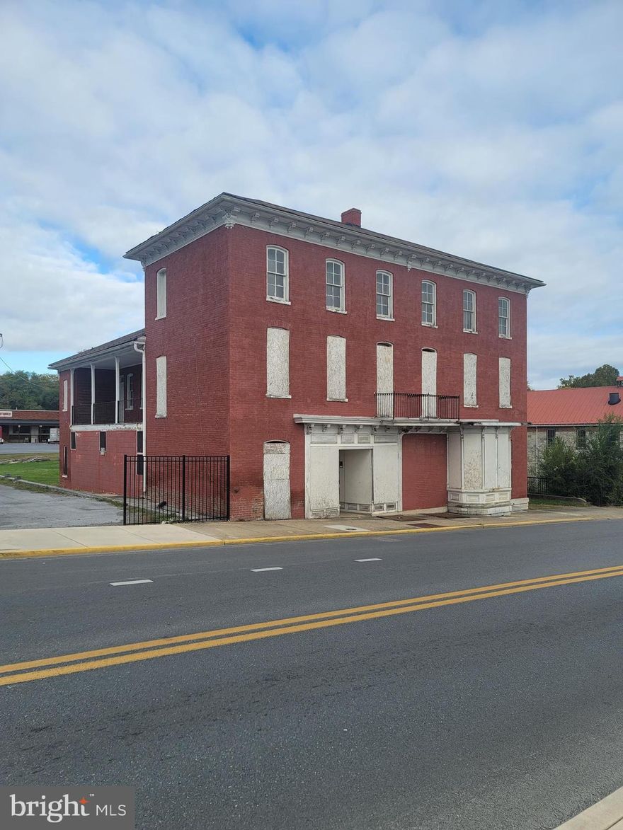 Great opportunity to make an impact on the impressive progress taking place in Martinsburg. This magnificent structure would be ideal for a plethora of applications such as dining or office space along with upper-level apartments. Situated on Queen Street with easy access to the Marc Train and amenities that Martinsburg provides. The interior is ready for your ideas as a blank canvas for your imagination and dreams to unfold. Schedule your showing and see if this property will fit your desires.