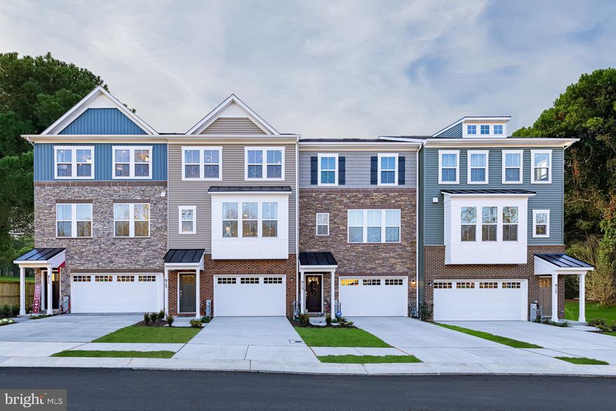 IMMEDIATE MOVE IN for this brand new townhome in Severn, located on one of the most desired homesites in the community! Enjoy morning coffee on your spacious back deck overlooking a forest conservation area.  This popular home offers an oversized 1-car garage, lower level rec room for entertaining, an open-concept layout and well-appointed finishes. Enjoy a chef-inspired kitchen with stainless steel appliances, granite countertops, upgraded cabinets, pendant lights, backsplash, and a center island. The kitchen overlooks a spacious dining area and great room, complete with an electric fireplace.  Hard surface floors are located throughout the entire kitchen level.  Upstairs you can utilize the conveniently located laundry room, near all three bedrooms, including the primary suite. Relax and unwind in this comfortable suite featuring an en-suite bath and a large walk-in closet. Additional upgrades in this home include: entry-level powder room in the rec room, plumbing and electrical upgrades, and more. Photos of similar home. Pricing, features, and availability subject to change without notice. MHBR No. 93 2023 Beazer Homes.