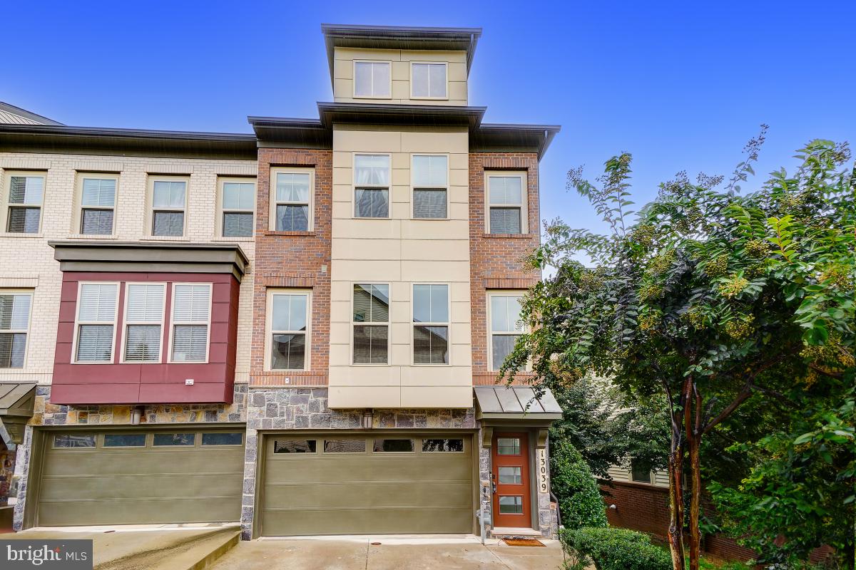 This stunning, four-level, brick-front end unit Custom Craftmark Townhome, built in 2018, is the epitome of modern living. Boasting 2,808 square feet of beautifully designed space, this home has everything you’ve been looking for.
Step into the home and be greeted by a magnificent recreation room featuring soaring 16'+ ceilings, a cozy gas fireplace, and upgraded lighting fixtures. The main level showcases a grand open-concept design with 9'+ ceilings, engineered hardwood flooring, and designer finishes throughout. The gourmet kitchen is a chef's dream, equipped with upgraded GE stainless steel appliances, soft-closing cabinets, a ceramic backsplash, quartz countertops, and designer light fixtures. Offer Deadline Mon 9/23 noon
The primary bedroom is a luxurious retreat, complete with two spacious walk-in closets and a bathroom featuring a dual vanity and double shower. The convenience of a laundry room on the same level as the bedrooms cannot be overstated. The top floor loft suite offers additional living space, perfect for a variety of uses.
Step outside to a private patio or enjoy the large Trex deck with picturesque views, ideal for savoring the changing seasons. Additional amenities include a two-car garage and driveway with 2 additional spaces.
Located within easy access to the MARC train station, I-270, and just a 10-minute drive to the SHADY GROVE Metro Station, this townhome is perfect for commuters. Don’t miss the opportunity to make this modern, stylish home yours!