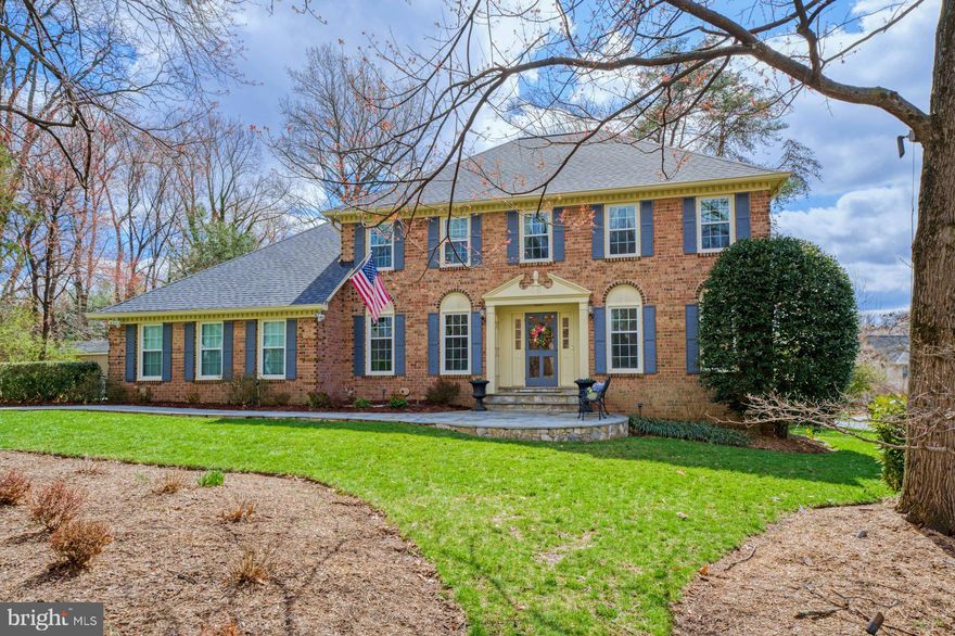 Open Saturday, March 21st, 12:00 Noon to 2:00 p.m.    Upgraded Top to Bottom, this fabulous all-brick colonial with side-load garage is one-of-kind!!!  Located on a flat, nearly 2/3's acre, quiet cul-de-sac, the home is filled with light with rear southern exposure.   You and your guests will be greeted by the welcoming slate front walkway, open foyer and the many updates.  What a gorgeous gourmet kitchen!!!  Completely remodeled less than  two years ago, it has Honey Brook white cabinetry; quartzite counters; stainless steel Miele, Bosch and Monogram appliances; a large island, recessed lighting and hardwood floors.  The kitchen opens to a breakfast area with a bay window and to the extended family room with cathedral ceilings, floor-to-ceiling stone fireplace, skylights, French doors and a ceiling fan.  The entire main floor has hardwood floors including the library with built-in cabinetry.  The living room, dining room and kitchen have crown molding and the dining room has a bay window and crystal chandelier.  Up the wooden staircase is the relaxing primary suite with a fully-outfitted walk-in closet with Elfa shelving, crown molding, a ceiling fan AND the sumptuous primary bath.   The completely remodeled bath has a free-standing, claw-foot, slipper tub and a separate designer shower with frameless glass.  Wow!!!  It has dual sinks with classic lighting and mirrors.... AND a skylight!   The three secondary bedrooms are all great sizes with wood floors and ceiling fans.  The beautifully remodeled upper hall bath has newer cabinetry, modern lighting and rectangular ceramic tiles in the flooring and shower.   What a super fun, happy, lower level!!! ..... It has great windows and an open floorplan with a recreation room / TV area / exercise area and a bar area with mini-fridge, sink and barstool seating.   There is also a quaint handy cubby office area, a larger den/office and the remodeled third full bath with large and small designer tiles and a pedestal sink.   The amazing rear yard includes a large deck with Trex flooring and speakers, just perfect for entertaining!!!  There is a handy shed, a paver sidewalk to the side yard and terrific front and rear outdoor lighting.   The roof is only two years old!   Walk a short two blocks to the Oakton Swim and Racquet Club with pools and tennis courts .... and best of all, you won't have to wait several years to be a member.  The sellers' membership is available under a separate sale.   The Waples Mill Estates community is convenient to Tyson's Corner, the Town of Vienna, Fairfax Corner, I-66, the Beltway and the entire Dulles Technology Corridor.