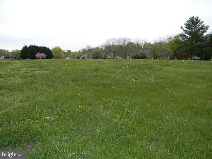 Beautiful corner building lot in the Pembrey Subdivision,  located just across from the waterfront Pembrey Community beach, pavilion & boat ramp access on the Elk River.   HOA fees are $275/annually.  There is a waiting list for memberships to the Pembrey Pier for a slip.  Slips  are an additional charge. This is the last undeveloped lot in the community!  All building plans to be approved by the Architectural Control Committee. This is a vacant lot, the new owner is responsible for well and septic installation upon building construction.