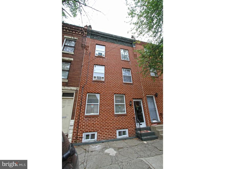Charming 4 bedroom 2 bath 3-story brick front riverside home in Fishtown. Needs a little bit of work. We love the huge back yard, green space ready for enjoying this Summer. Enter in through a formal vestibule to the open floor plan. You'll notice the original arched decorative ceiling soffit that subtly divides the living room and dining rooms. There is a fire place in the living room made with stone, adding an element of texture and warmth. Recess lighting in the living room and a ceiling fan in both the living room and dining area. The side staircase is neatly tucked away allowing for a huge open air feel that is oh so sought after.  The eat in kitchen is filled with solid hard wood cabinetry, recessed lighting, and stainless steel appliances. There is access to the rear yard from the kitchen making grill-to-table a breeze. The upper floors have 2 updated large full baths and storage vanities, and 4 (yes 4!) nice size bedrooms with plenty of closet space. There is a convenient 2nd floor laundry room, with side by side washer and dryer and plenty of space for all kinds of storage. This is a must see. In walking distance to all of the awesome restaurants, shops, and social venues in the neighborhood. Welcome!