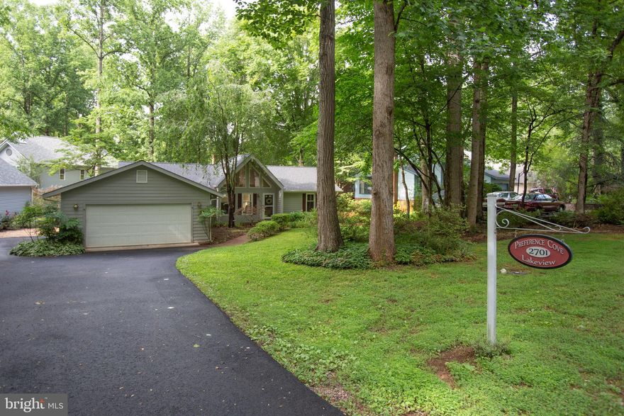 Let's get this lake life started! Dock the boats right at the house, enjoy countless days swimming and fishing, playing in the yard and relaxing on the expansive deck! This house is perfect for entertaining and making memories! Boasting an open concept layout, gorgeous sun room to enjoy the atmosphere whether there is rain or shine, soaring ceilings walls of windows and gleaming hardwood floors. Feel like venturing out? There is plenty to do in the community. A private, gated, secured community, Lake of the Woods offers anything and everything you could possibly want. Home to two lakes (the 550 acre main lake and a 35 acre "fishing lake"), a golf course, an equestrian center, a fire and rescue department, and a church all within the gates, Lake of the Woods simply has it all. Whether your passion is boating, waterskiing, kayaking, golfing, horseback riding, or simply taking in the breathtaking views from the clubhouse while enjoying a fabulous meal, from your own deck or yard, or from one of the beaches, you won't be disappointed! Perhaps you'd like a game of bridge or volunteering your time and talents...Lake of the Woods offers more than 60 clubs and/or organizations from which you may choose to become involved. Located in Orange County, we are fortunate to enjoy low real estate taxes. Coupled with home prices ranging from $100,000 to over $2,000,000, Lake of the Woods is the perfect community for both full-time residents, as well as weekenders. But don't take my word for it, please come see for yourself! I will gladly give you a tour of Lake of the Woods by boat and by car so that you may experience why I love Lake of the Woods!