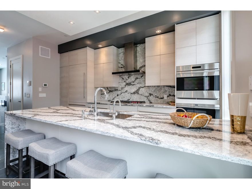 Three homes already sold!! get in before any price increases! One of a kind New Construction with Elevator, 2-car garage, 4 Decks including two Roof-decks, Smart-home tech system,luxurious and most finely appointed details in the city. Liberty Estates  Townhomes has it all. Included in this sophisticated home is a theater room, and a game room with large wet bar that's perfect for entertaining. The living room, dining area and living room has heated floors. The wide open and extra wide living area has a built in fireplace with stone ledge, and this magnificent space spills onto a rear tiled deck that will make you feel like you are in Miami. The kitchen is spectacular, with Sub Zero and Wolf appliances, custom Italian cabinetry, custom counter tops including a HUGE island with cascading waterfall stone edge and a custom floating ceiling with accent lighting. The extra wide, 20' wide floor plan allows for a huge dining area right next to the kitchen. The interior iron railing system continues throughout the home along an elegant Black Walnut wood staircase. The roof decks are equipped with a kitchenette with sink, fridge and built in grill. The private deck off the master suite, and the deck off the living room supply a ton of outdoor square footage. All of the bedrooms have great space and have ample walk in closets and accompanying bathrooms with the finest Grohe and Kohler finishes. The full floor master suite has it all, a six foot Kohler soaking tub, heated floors, double vanity, glass tile shower, deck and huge closets. Each bathroom is unique and has only the best materials. The woodwork throughout the home is stunning- including the custom baseboards and solid wood doors t/o. This may be the most well thought out home in the city. Not one inch of space has been wasted. Come visit our 100% complete and ready to be lived in Model home. Still time to customize the other homes in the development. tax abatement pending!! Check OPA for 2019 taxes due to possible citywide reassessment.