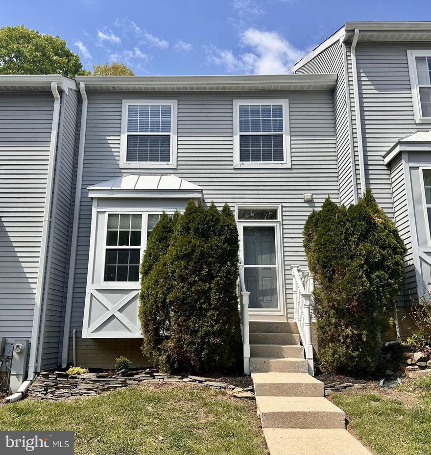 Welcome to 640 Nanticoke Ct, a beautifully maintained 2-bedroom, 1.5-bath townhome located in the desirable Crisfield Crossing community in Abingdon. This home offers a bright and inviting layout, highlighted by a sun-filled bay window and a cozy wood-burning fireplace in the living room. The eat-in kitchen features granite countertops, stainless steel appliances, and a convenient breakfast bar, with sliding doors that lead to a spacious deck—perfect for outdoor dining and relaxation. The finished lower level is ideal for entertaining, complete with a built-in bar and walk-out access to a covered paver patio. 
Upstairs, the primary bedroom boasts a vaulted ceiling, while the second bedroom is enhanced with elegant crown molding. The full bath includes a soaking tub and separate shower for added comfort.
Additional highlights include recessed lighting, crown molding, chair rail detailing, and fresh neutral paint throughout. Recent updates include the roof w/ transferrable warranty, heat pump, water heater, and stove (see full list).