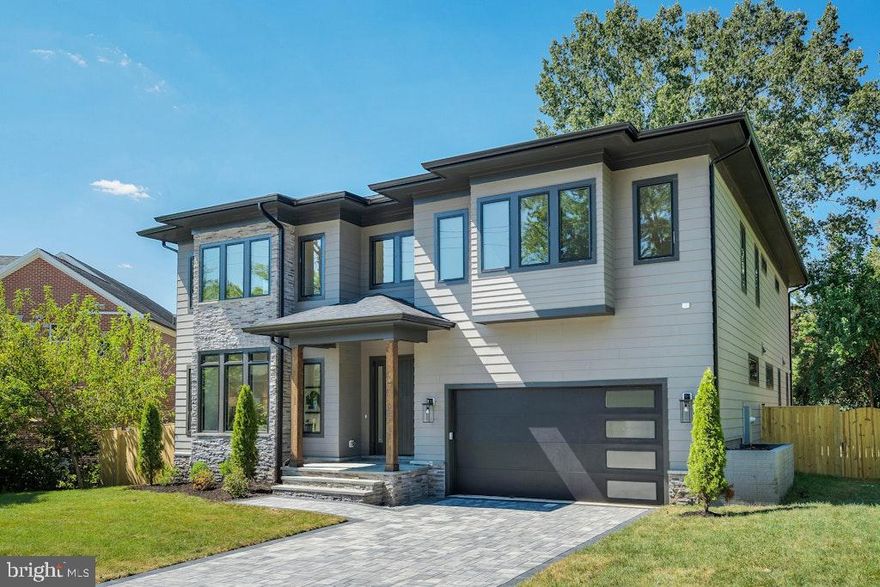 Introducing 5225 Little Falls Rd, a breathtaking new construction home by Touchstone Homes, located in the coveted Rock Spring neighborhood of Arlington, VA. This nearly 7,000-square-foot residence, situated on an expansive 11,200-square-foot lot, offers an unparalleled blend of luxury, comfort, and customization opportunities. Open Sunday 2-4!

Zoned for the highly regarded Discovery Elementary, Williamsburg Middle, and Yorktown High School districts, this home is perfectly positioned for families seeking an exceptional location. The exterior showcases timeless Hardiplank siding, durable 30-year architectural shingles, and energy-efficient Andersen 200 Series windows and doors.

Inside, the home impresses with modern elegance. Wide-plank 8 ½” Opus European White Oak engineered flooring graces the first and second levels, while the lower level features Coretec Pro Plus LVT and upgraded carpeting in the media room for added comfort. A 40” Callaway linear fireplace with remote adds a cozy yet sophisticated touch to the main living space, and custom tilework enhances every room.

The chef’s kitchen is a true standout, designed with Fabuwood cabinets, a custom range hood, sleek quartz countertops, and a premium Subzero/Wolf appliance package. It includes a 42” panel-ready refrigerator, a 36” 6-burner range, a 30” E-Series oven, and a 24” panel-ready Bosch dishwasher, ensuring a culinary experience of the highest caliber.

The property features a very large fenced backyard, ideal for outdoor activities and gatherings. For those seeking even more, there is an option to add a screened-in porch, offering a unique opportunity to customize this incredible space to your exact needs.

Modern conveniences include high-efficiency Carrier HVAC systems, wireless Honeywell thermostats, energy-saving LED recessed lighting, and a 75-gallon hot water heater. Designer fixtures from Visual Comfort, Kichler, and others provide a sophisticated aesthetic, while Brizio and Delta plumbing fixtures add a luxurious touch.

Peace of mind comes with the comprehensive Builder’s New Home Warranty, ensuring your investment is protected. From expansive living areas perfect for entertaining to cozy spaces designed for family enjoyment, this home has it all.

Don’t miss this opportunity to own a one-of-a-kind property in a premier Arlington location. Contact us today with any questions and to take advantage of the final customization options. Schedule your private tour of 5225 Little Falls Rd and discover why this exceptional home is the perfect place to call your own.