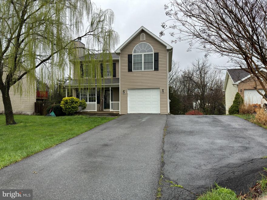 Welcome to 102 Virgo Lane, Martinsburg, WV! This charming three-bedroom, 2 1/2 bath home boasts a cozy wood-burning fireplace and a one-car garage, situated on a spacious .24-acre lot. The sellers disclose that they have never utilized or used the fireplace during their ownership. Additionally, this home features a basement for added space and functionality. Enjoy ample parking in the paved driveway and the serene setting of the surrounding landscape and amazing  WILLOW Trees! More photos to come- please be advised one owner is Agent ( Roderick) .