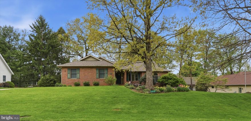Well-maintained 4-bedroom Ranch-style home, in desirable Penn National Golf Course Community.  Cathedral ceilings, Hardwood floors, and an In-Law suite (in the basement), are just a few of the outstanding features this home offers.  The In-law suite features a full kitchen, full bath, and convenient outside access.  Recent upgrades include Refrigerator, Stove, Dishwasher, and Dryer.  HVAC replaced in 2022.  Wood-burning fireplace converted to a Natural gas fireplace.  Roof was installed in 2018 with a 10-year warranty.  Large attached garage, screened-in porch, and paved driveway, make this home perfect for entertaining.  Plenty of storage space in the basement as well.  And the amenities in this community ensure you'll have easy access to an active and healthy lifestyle.  You'll be within walking distance of a beautiful golf course, pickleball courts, tennis courts, and a Wellspon Health center.  And the views are beautiful!  This is a home you just have to see!