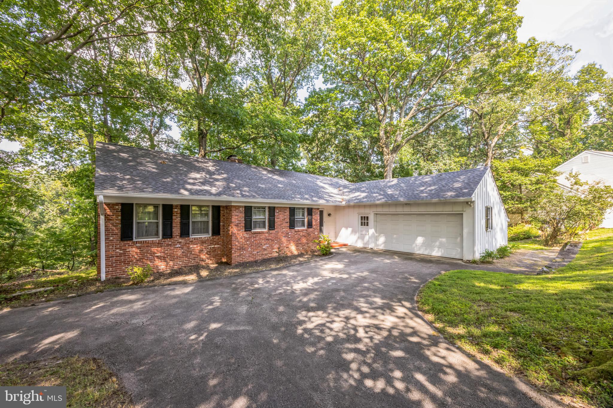 If you are looking for that perfectly located home in Paoli, then look no further than 207 Vincent Road. Located in the prestigious T/E School District and minutes from the Paoli train station, this four-bedroom home has a lot to offer. Upon entering into a slate-covered foyer with a convenient coat closet, one can access the formal living room with a fireplace and sliders out to the second-floor deck which overlooks a bird sanctuary. The formal dining room is accessible from both the living room and kitchen and has built-in corner cabinets for added convenience. The eat-in kitchen with a raised ceiling offers electric cooking, a separate bar sink, and a much-coveted pantry. The central hall leads to a spacious primary bedroom featuring an ensuite bathroom. There are 2 additional large bedrooms on this level, a full bath with shower/tub combo and dual sinks, a utility closet, and an attic access. The lower level features a private guest suite with an ensuite full bath, a family room with a fireplace, and a large basement with an adjacent crawlspace for storage. This home also features central a/c, hardwood floors throughout the main level, and an attached spacious 2-car garage. Schedule your showing today and get settled as the new school year begins!