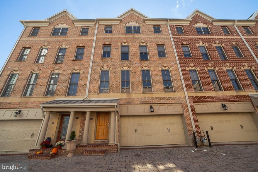 REDUCED! SOPHISTICATED URBAN LIFESTYLE AWAITS YOU! RARELY AVAILABLE, THIS 4 BR, 4 CAR PARKING WATERFRONT TOWN HOME OFFERS CAPTIVATING WATER VIEWS FROM EVERY LEVEL. 4000+ SQ FT. 3 GAS FIREPLACES, HARDWOOD FLOORS THROUGHOUT. GOURMET KITCHEN, 3 BALCONIES, OPEN MAIN LEVEL GREAT FOR ENTERTAINING EASY ACCESS TO PROMENADE. WAKE UP ON VACATION EVERY DAY IN THIS GATED COMMUNITY IN THE HEART OF CHARM CITY.