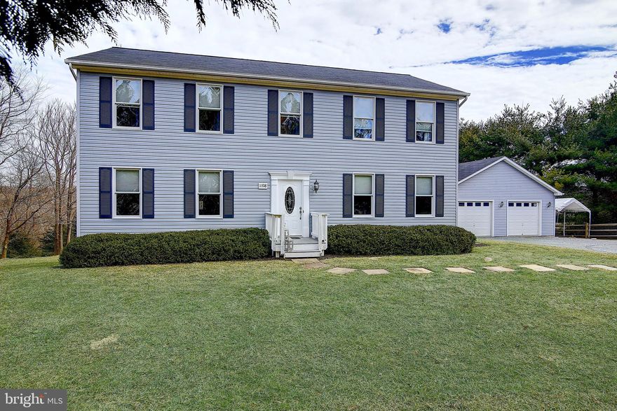 Spacious and modern living on 6.5 beautiful, private acres in Frederick County, MD! Enjoy a beautiful walk through the 4.5 wooded acres with natural stream!Zoned for Agriculture   No Restrictions! Close to I-70 & I-270, this is a great location for commuters! The interior features 4 beds, 2.5 baths. 2,400 sq. ft.  Carpeting throughout.  Enjoy meals in the formal dining room or in the gorgeous upgraded kitchen with a sitting area, stainless steel appliances, granite countertops, and a breakfast bar.  A brightly lit family room sits right off the kitchen.  A separate, expansive living room sits opposite the family room and features a beautiful bay window. The upper level features 4 roomy bedrooms, including the master bedroom suite boasting a walk-in closet and beautiful attached master bathroom with a soaking tub and walk-in shower.  The lower level is partially finished with tons of potential to be finished to create another living space, game room, or extra bedroom. Entertain guests on the expansive back deck or relaxing in your gazebo looking out on gorgeous tree views!  Oversized, detached 2 car garage.  Outdoor firepit and plenty of space for gardens or raising horses!