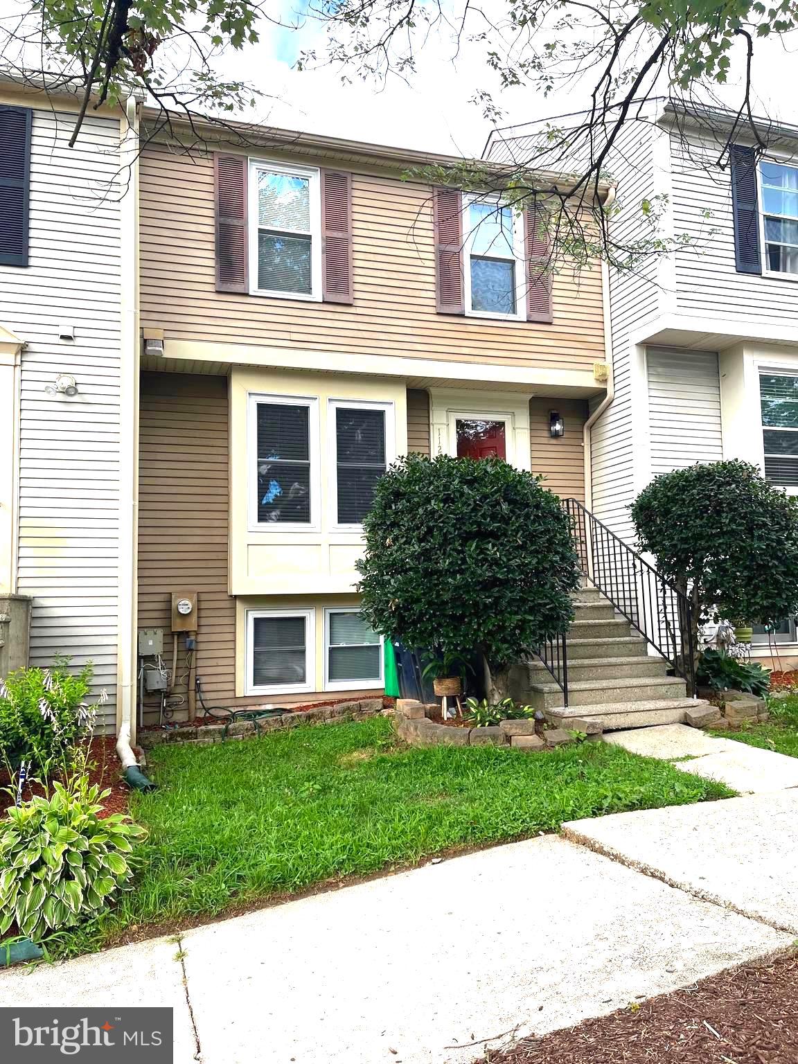 Beautiful townhome features 3 bedrooms, 3 full baths and a half bath on the main level. Luxury vinyl tile throughout main level and basement. Kitchen has granite countertops and stainless steel appliances and overlooks living room with fireplace and view of deck. Upper level has 2 spacious master bedrooms with private bath and ample closet space. Private bedroom in basement off rec room with sliding door leading to patio in backyard. Great rental opportunity move in ready. Conveniently located to shopping centers and metro bus.