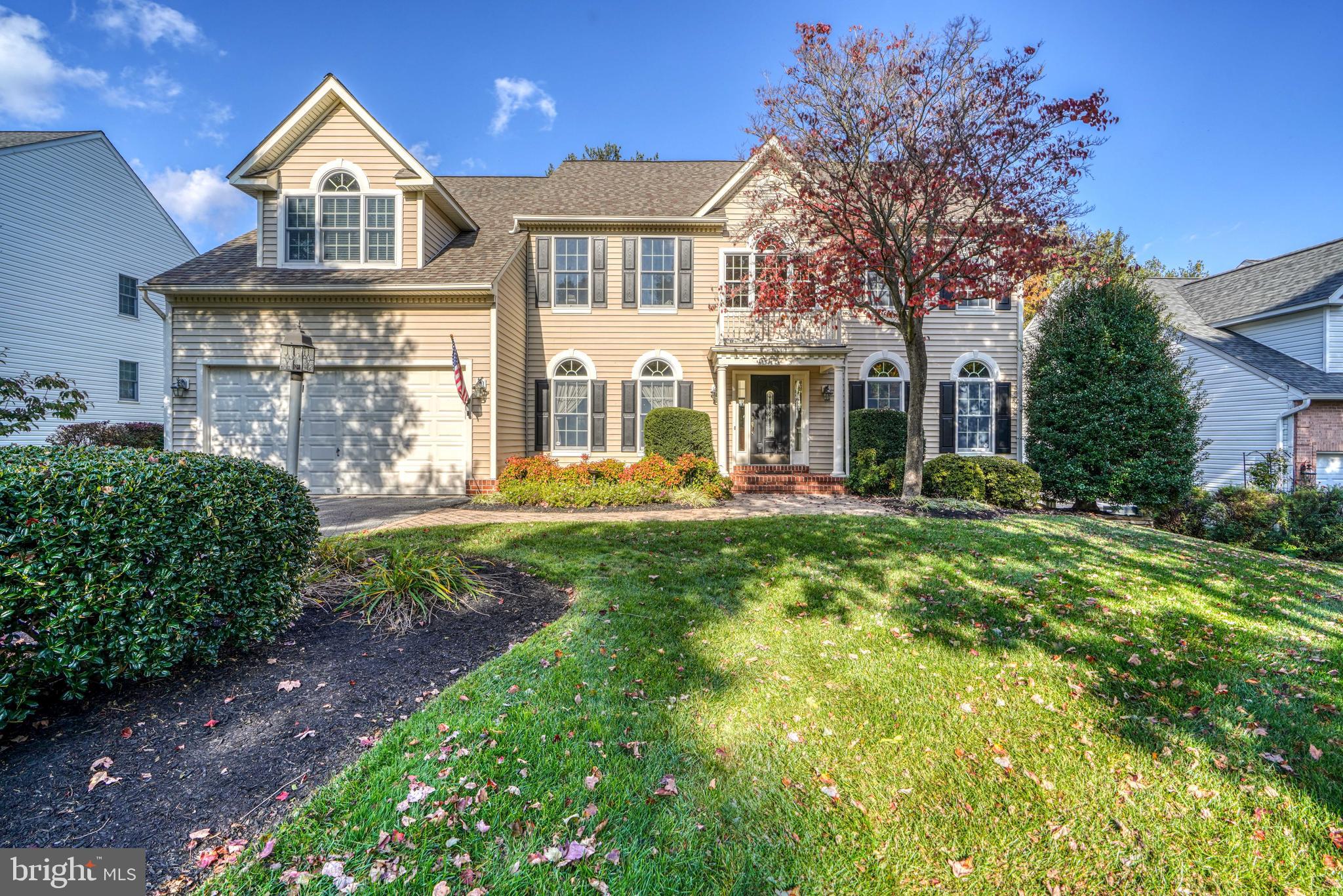 Welcome to this stunning 5-bedroom, 4-full bath, and 1-half bath colonial home located in the highly sought-after Turf Valley Overlook neighborhood. This home offers a rare gem - a third-floor 5th bedroom with a full bath, providing additional flexibility and space. As you enter, you'll be greeted by a grand two-story foyer leading you into the two-story family room, creating a dramatic and inviting atmosphere. Large formal dining room great for entertaining family and friends. The chef's kitchen has been tastefully updated with high quality cabinets, stainless appliances, and beautiful granite countertops, perfect for culinary enthusiasts. The first floor also features a versatile office/6th bedroom with a connecting full bath and closet, offering convenience and privacy. Mostly hardwood floors throughout the main level add a touch of elegance and durability to the home. The two-sided gas fireplace adds a cozy ambiance to both the family room and kitchen area. The owner's bedroom is a true retreat, complete with office area, walk-in closet, and a large owner's bathroom featuring a soaking tub, separate shower, and double vanities. The lower level boasts a spacious recreational room, ideal for entertaining, with sliders walking out to a level backyard, perfect for outdoor activities and gatherings. recently upgraded architectural roof in 2018 and both HVAC systems in 2020! Convenient to shopping, recreation, and dining. Don't miss this opportunity to own this exquisite home in a prime location!