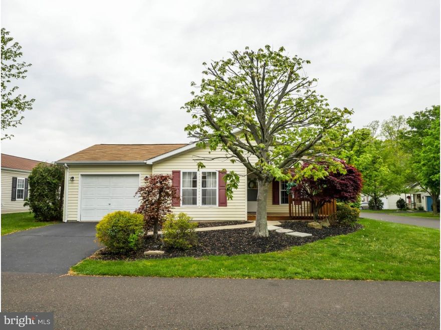 The Village of Buckingham Springs is a pristine Active Adult Community ideally located in Central Bucks County. The private streets of this vivacious neighborhood lead you to 197 Cardinal Court South. A corner location, this two-bedroom home greets you with lovely landscaping and a twelve by twelve covered porch. Walk into the inviting great room with vaulted ceiling and electric fireplace. There are brand new carpets, flooring and fresh paint throughout as well as a new HVAC system and a whole house humidifier making this home completely move in ready. With lots of cabinetry, sleek brand new refrigerator and dishwasher and a double basin stainless steel sink the kitchen boasts a breakfast bar, pantry and brand new floor and skylight. Spacious and open the dining room has an easy flow for entertaining and daily living. A vast family room with attractive knotty pine paneling allows for a great multi-purpose space for relaxing and includes an exterior door to a cement patio perfect for a grill.  Filling with natural light a den gives you a versatile space to create an office or sitting room.  Your master suite features two double closets a lighted ceiling fan, an abundance of natural light and a master bath with a double vanity, jetted soaking tub, and glass shower enclosure. A spacious laundry room provides extra cabinet storage. With a full hall bath nearby the second bedroom is an ideal guest quarters. There is also an attached garage that is insulated, painted, has more storage and an electronic door opener. The community offers a diverse list of clubs for every interest, has a bustling clubhouse, with library, fitness center, heated swimming pool, computer room and so much more. There are day and overnight bus trips and a community bus for local shopping. With picturesque ponds and an ideal location minutes from Doylestown, New Hope and Newtown let Buckingham Springs welcome you home.
