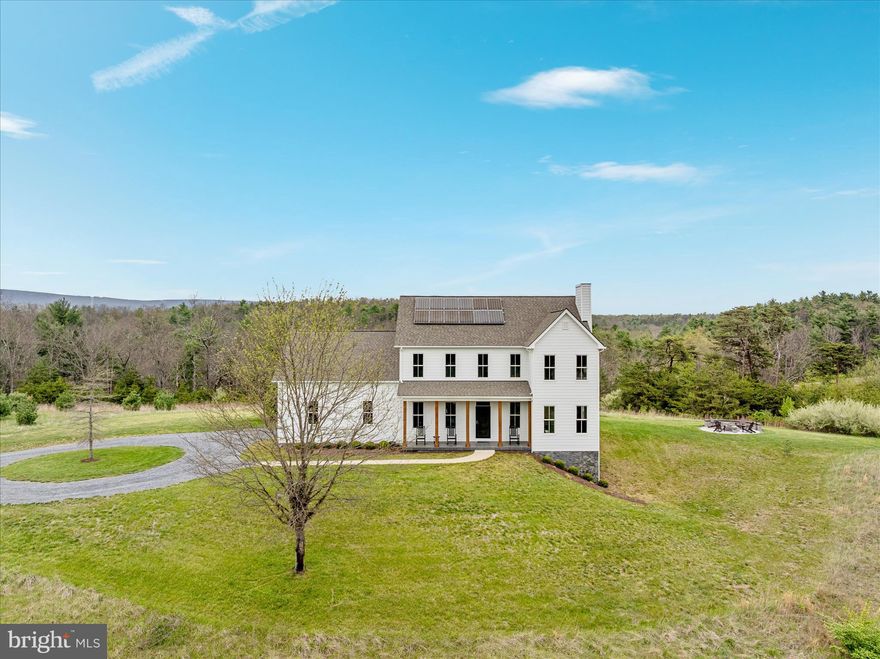 Stunning Modern Farmhouse Colonial with Breathtaking Mountain Views and highspeed internet!

Welcome to this exceptional modern farmhouse colonial, perfectly positioned to capture sweeping mountain views—especially from the inviting front porch. Nestled on a picturesque knoll, the home overlooks a tranquil pond and a landscape dotted with beautiful, stately homes. Enjoy frequent wildlife sightings and the peaceful charm of country living - And with high-speed fiber-optic internet, working from home is seamless—enjoy the serenity of country living without sacrificing modern connectivity.

This thoughtfully designed home features 4 bedrooms and 3 full baths, including a convenient main-level bedroom and full bath—ideal for guests or multi-generational living. The open, flowing floorplan offers both comfort and functionality, perfect for everyday living and entertaining.

Step outside to the incredible screened-in back deck—an ideal extension of your living space. Whether you're enjoying morning coffee, evening sunsets, or entertaining guests, this outdoor retreat offers comfort, privacy, and year-round enjoyment surrounded by nature.

Upstairs, you’ll find three spacious bedrooms, including a luxurious primary suite. The additional bedrooms are connected by a Jack & Jill bath, offering both privacy and convenience.

With 9-foot ceilings on all three levels, the home feels bright and expansive throughout. The partially finished lower level adds even more versatility, featuring a unique golf simulator (which can convey), a rough-in for a future full bath, and abundant storage space.

Eco-conscious buyers will love the fully paid-off solar panels, providing energy efficiency and long-term savings.  There is no HOA, but there is a $300/year road maintenance fee and deed restrictions. Recent additions - Screened back deck , new front porch, new flooring, fire pit area, pellet stove and a finished basement.  Over $120k in upgrades. 

This home truly has it all—style, space, views, outdoor living, and modern convenience. WOW! Don’t miss it!